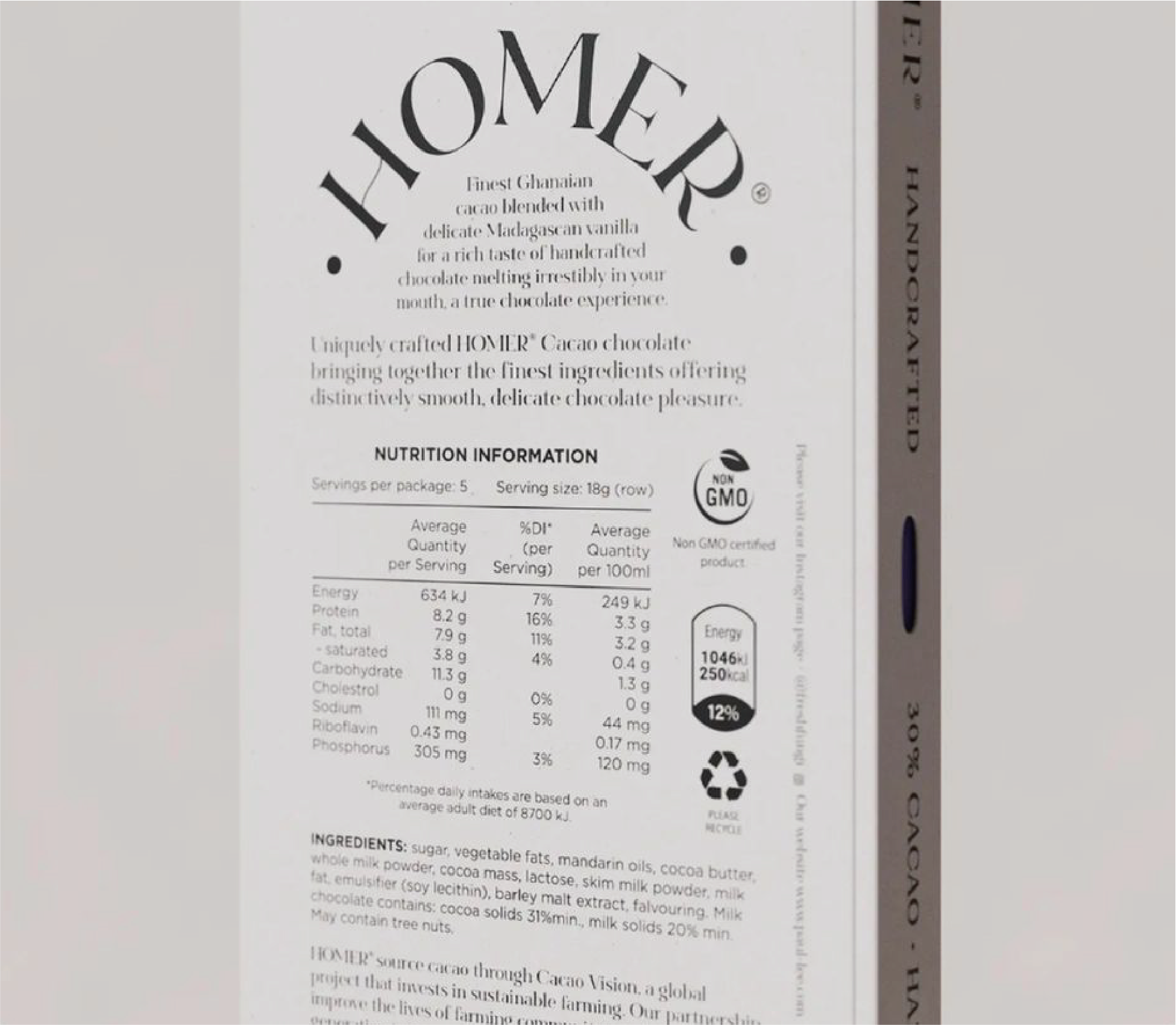 A beautifully presented box on a white background with the word "HOMER" in capital letters and some descriptions of the chocolate ingredients and nutritional information.
